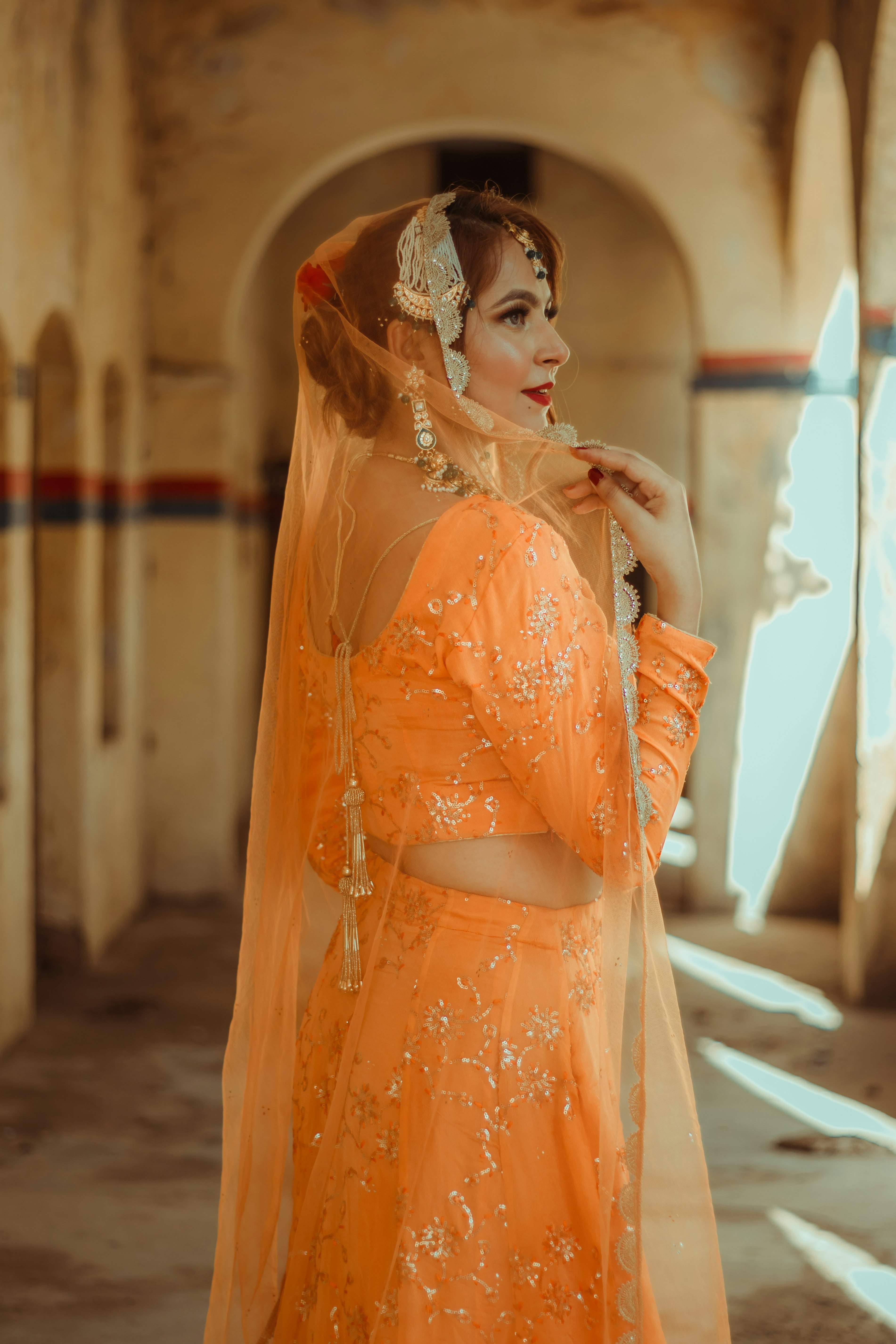 woman in yellow and white floral dress